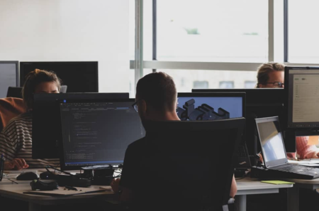 Software developers work on software projects in the office
